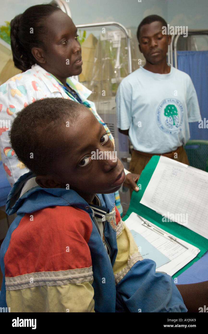 Dr Monica with young HIV Aids patient at Mildmay hospital Kampala ...