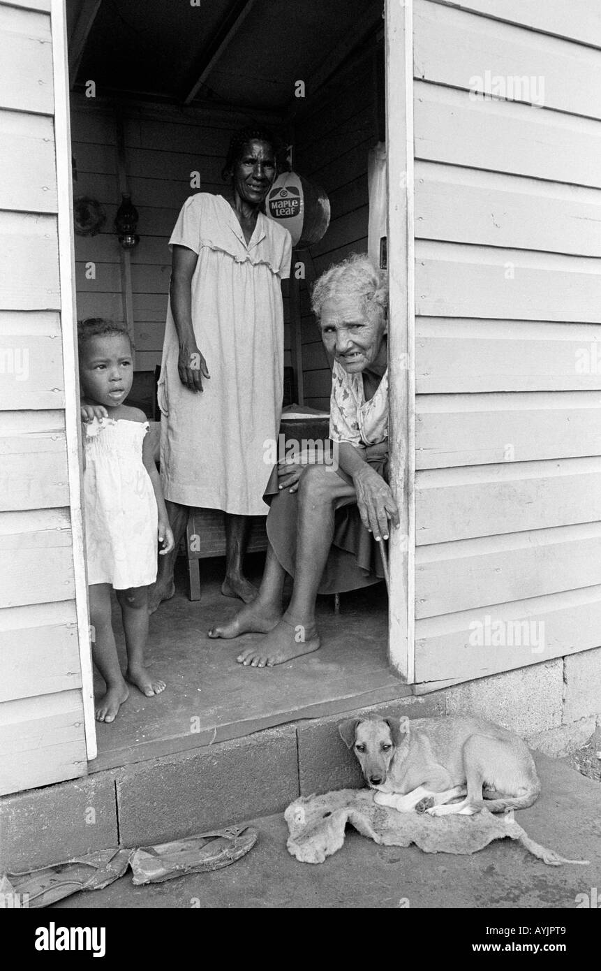 Elderly women in the doorway of their home in a poor urban area. Jamaica Stock Photo