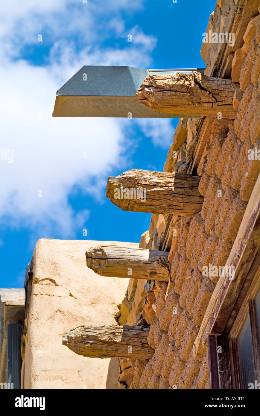 Low angle shot of adobe building with vigas on an Indian reservation New Mexico USA Stock Photo