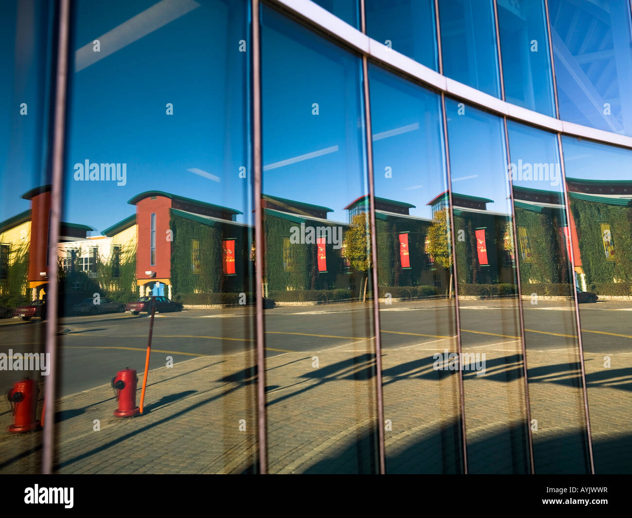 City scene reflected in windows, The Forks, Winnipeg, Manitoba, Canada Stock Photo