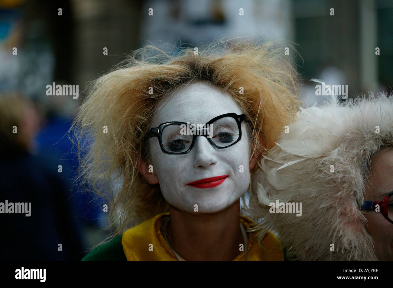 Female in clown make-up with comical glasses staring, Edinburgh Fringe Festival Scotland Stock Photo