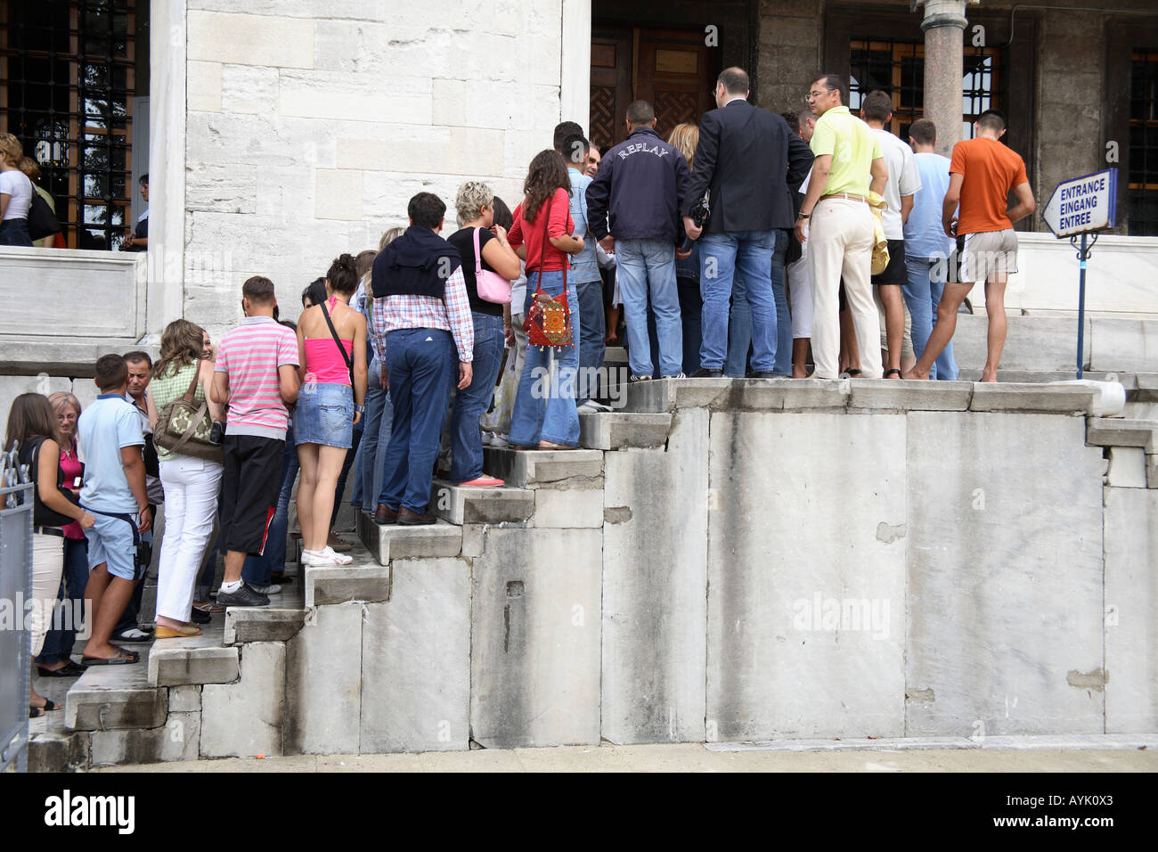 Tourists queuing at entrance to the Blue Mosque. Sultanahmet, Istanbul, Turkey Stock Photo