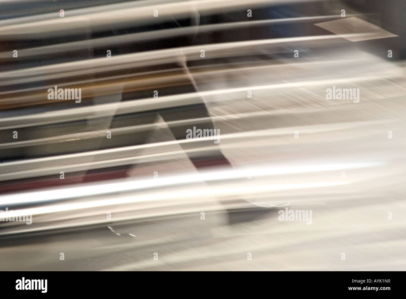Blurred shot of the legs of a business man walking at a fast pace on a city sidewalk conveying sense of urgency Stock Photo