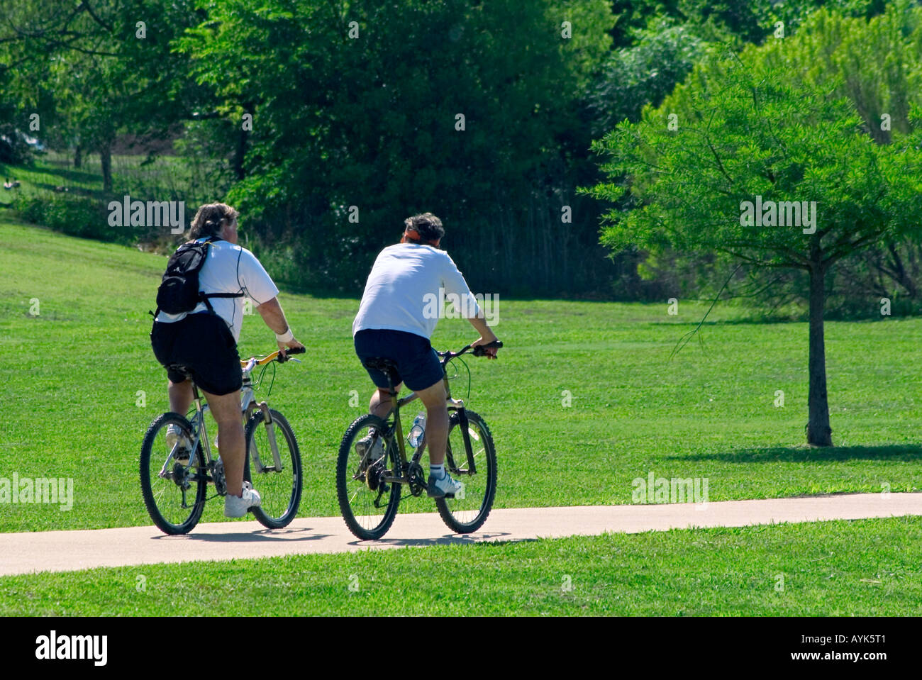 two people riding a bike