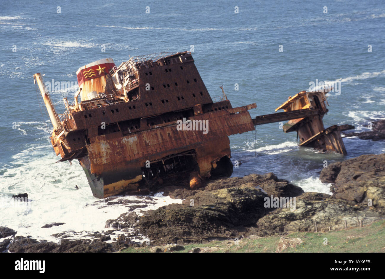 Remains of a wrecked ship on rocky coastline Stock Photo - Alamy