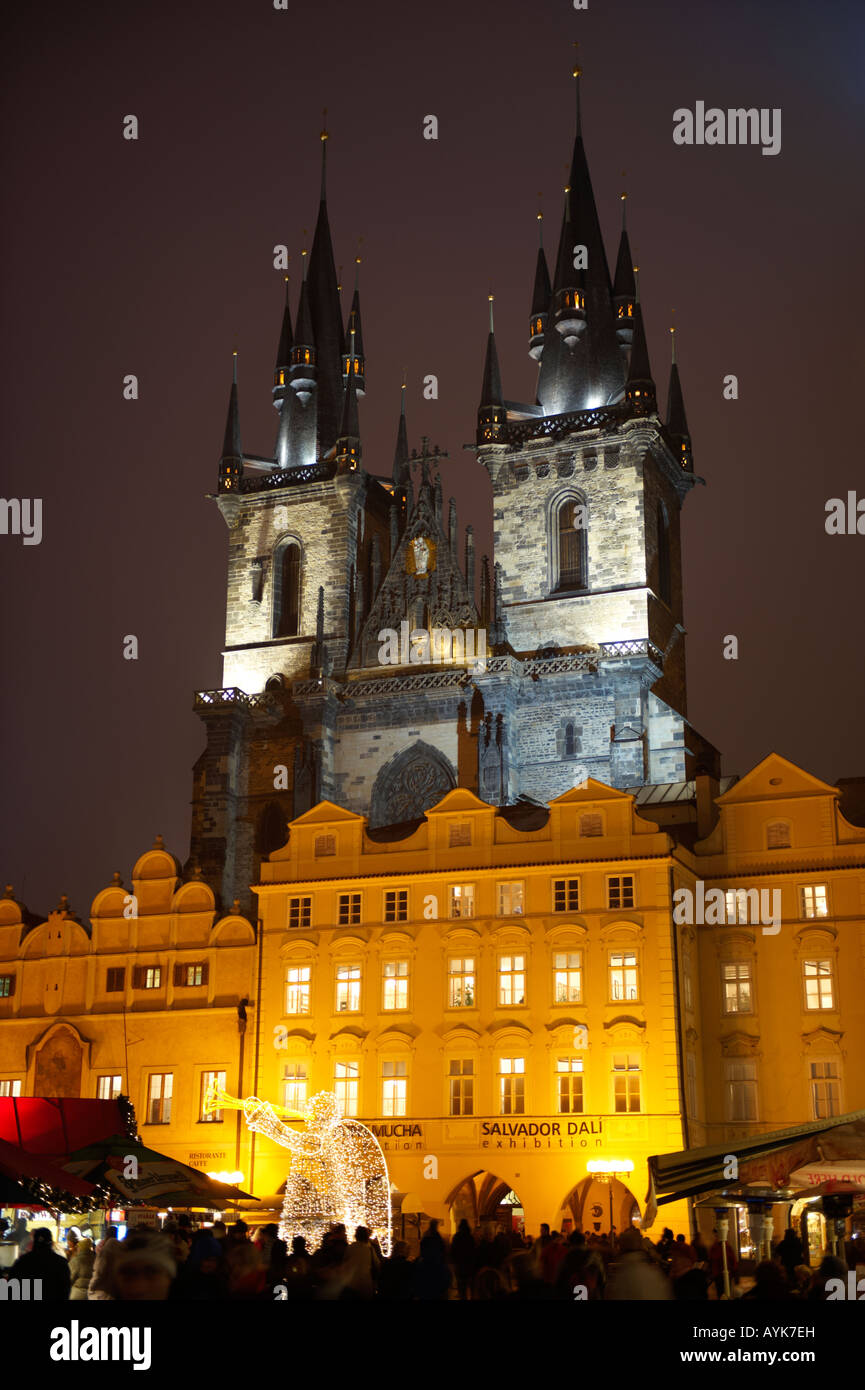 Christmas Market In Prague's Old Town Square with Church Of Out Lady Before Tyn at night Stock Photo