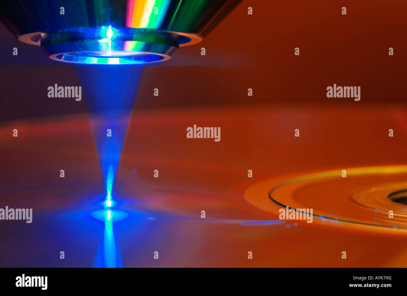 Blue laser reading/writing a Blu ray disc Stock Photo - Alamy