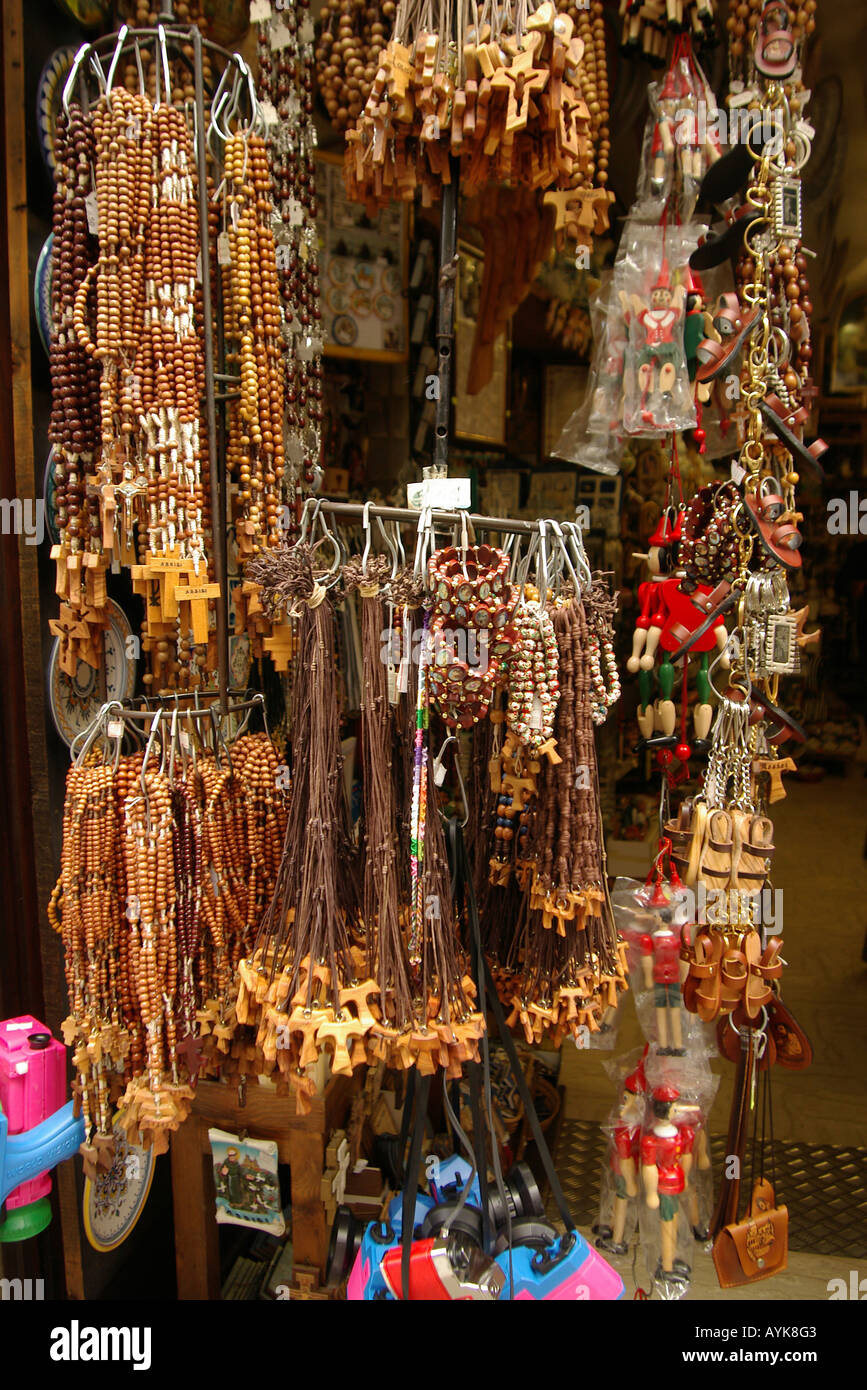 Souvenirs for sale, slingshots and trinkets in Assisi Italy upright