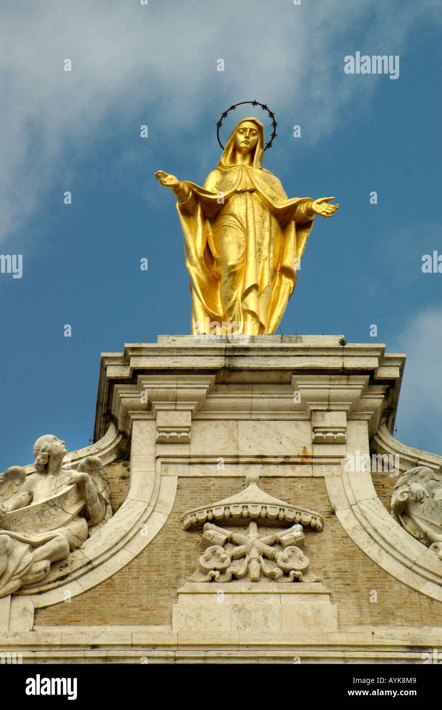 Golden statue of Madonna, The Basilica of Santa Maria degli Angeli, Assisi upright vertical portrait Stock Photo