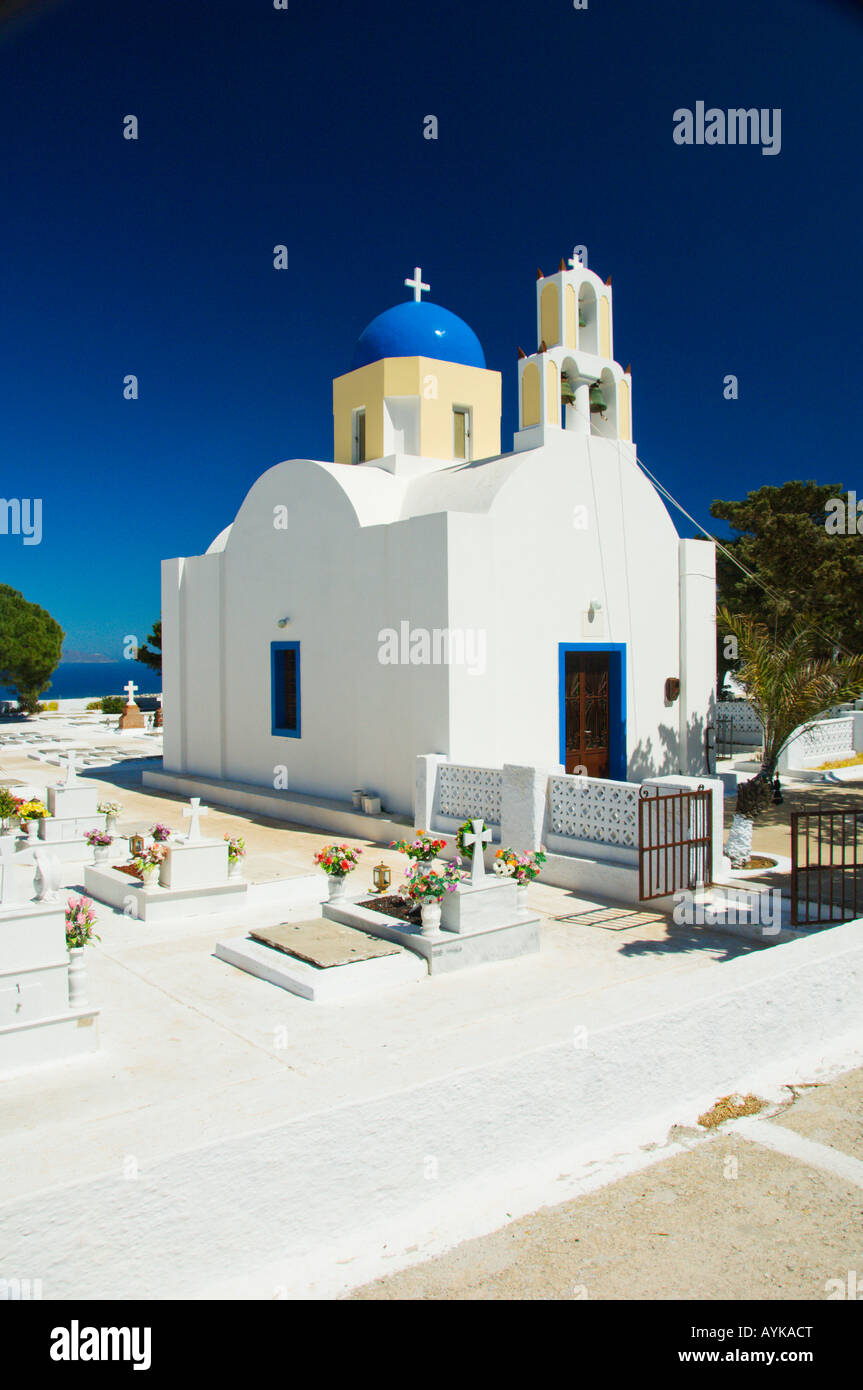 Traditional blue domed church in the village of Fira on the Greek