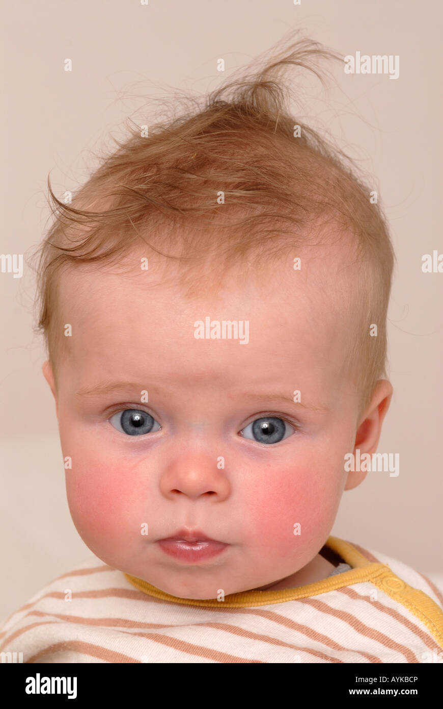 Cute portrait of a little baby boy with rosy cheeks Stock Photo Alamy