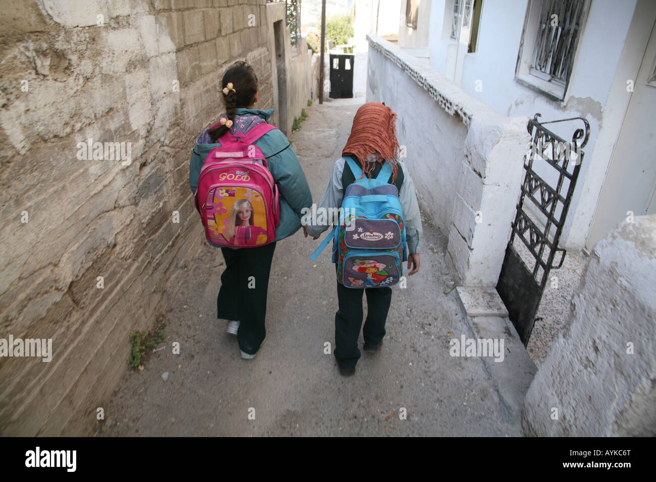 Two girls walk to school Amman Jordan Many Iraqi have settled there because the ongoing violence in their country Stock Photo - Alamy