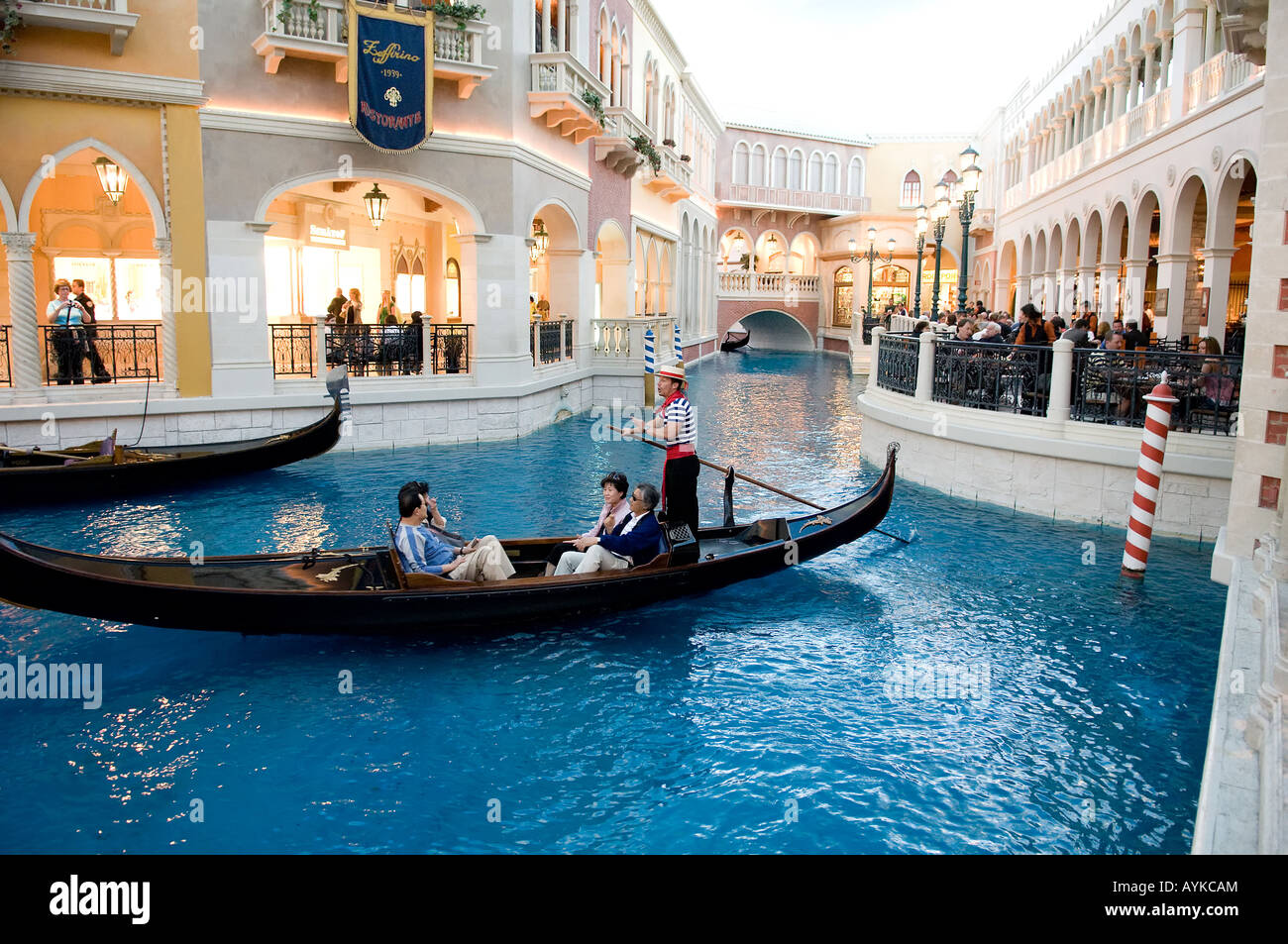 A gondola glides along the indoor canal of the Venetian Hotel in Las Vegas. Stock Photo