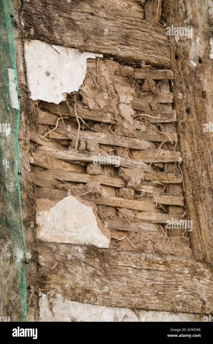 Detail of lath and plaster construction of a Run down semi derelict half timbered house in the village of Lyonshall England UK Stock Photo