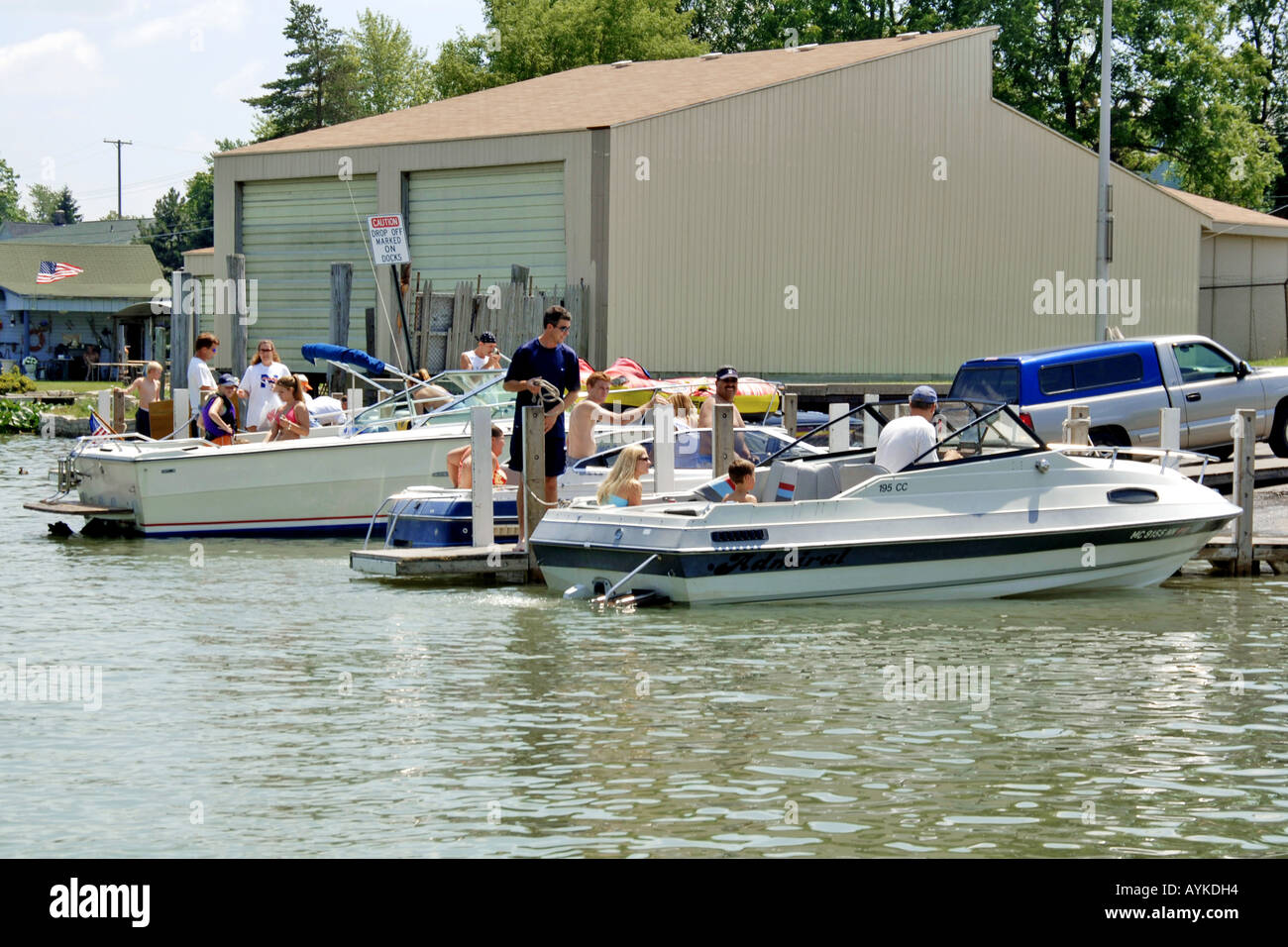 People having fun at a boat ramp on thr blackwater river Port Huron MI