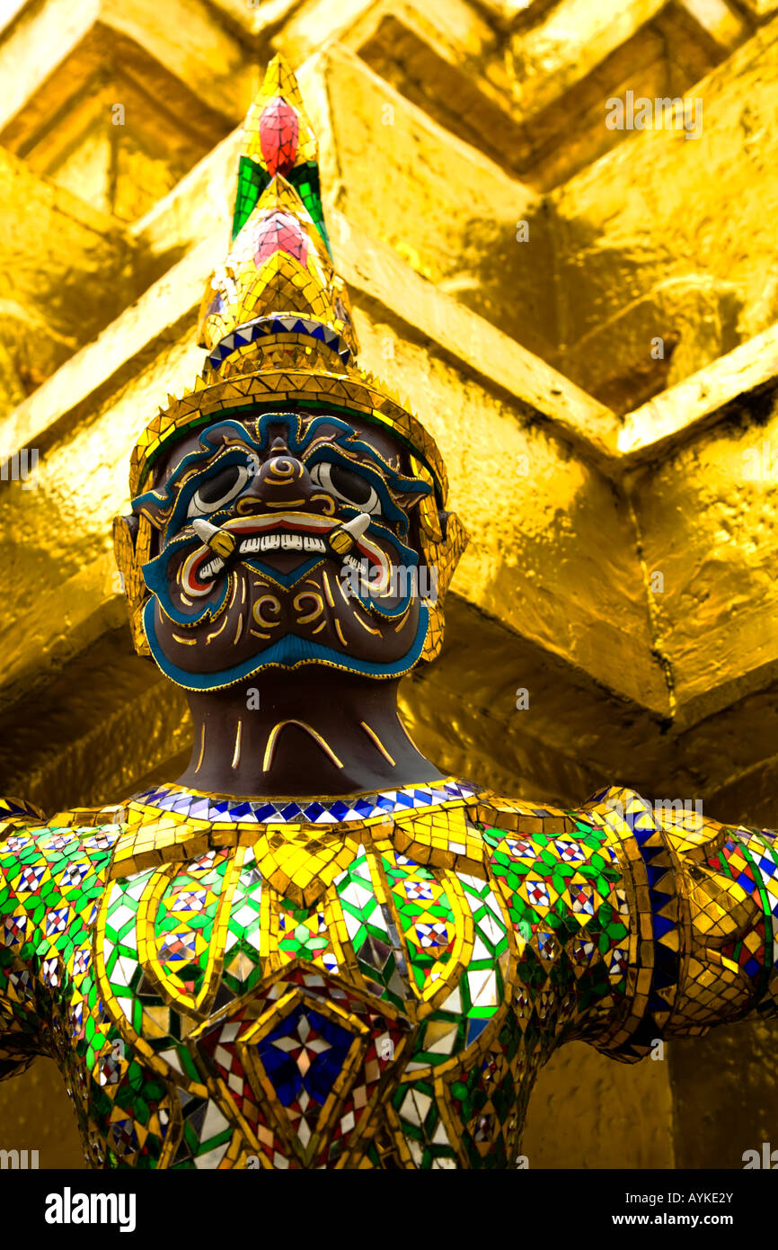 Thailand Bangkok The Grand Palace Statue in the ornate setting of the ...