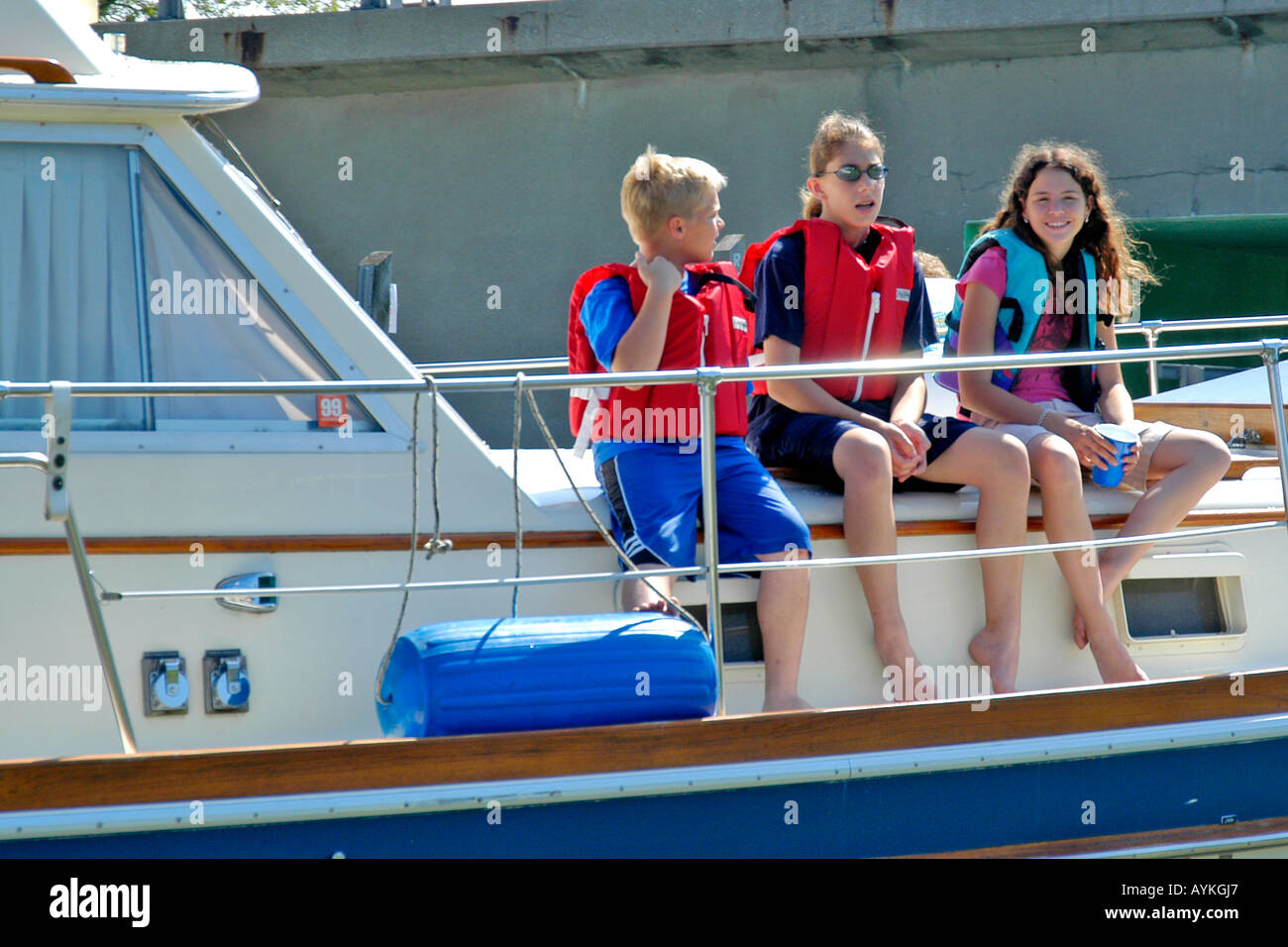 Girls wearing life jackets on hi-res stock photography and images - Alamy