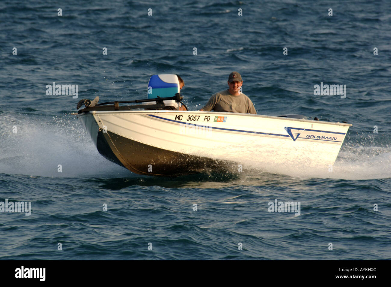 Small two man fishing boat with an outboard motor on the St Clair River  Michigan Stock Photo - Alamy