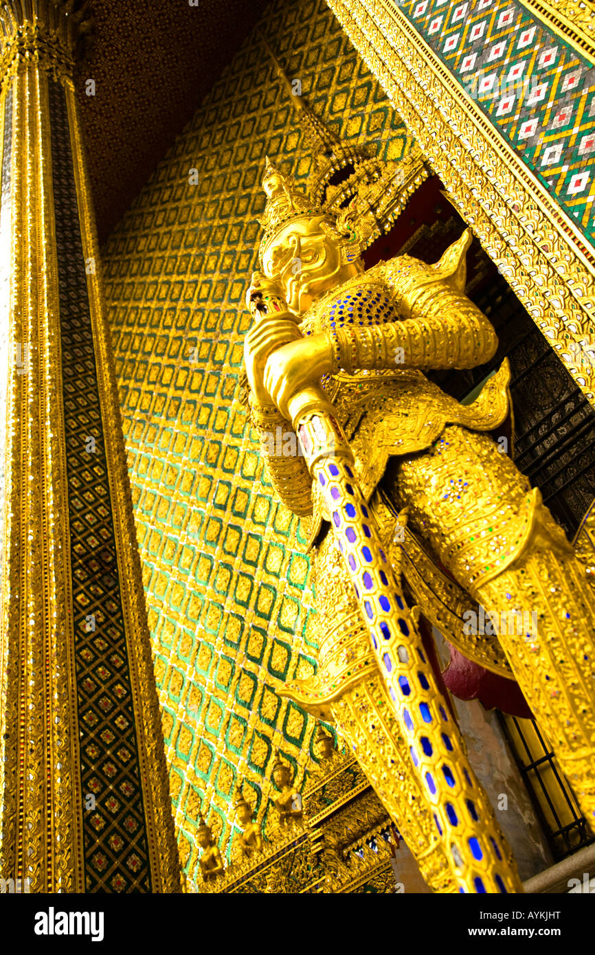 Thailand Bangkok The Grand Palace Statue in the ornate setting of the ...