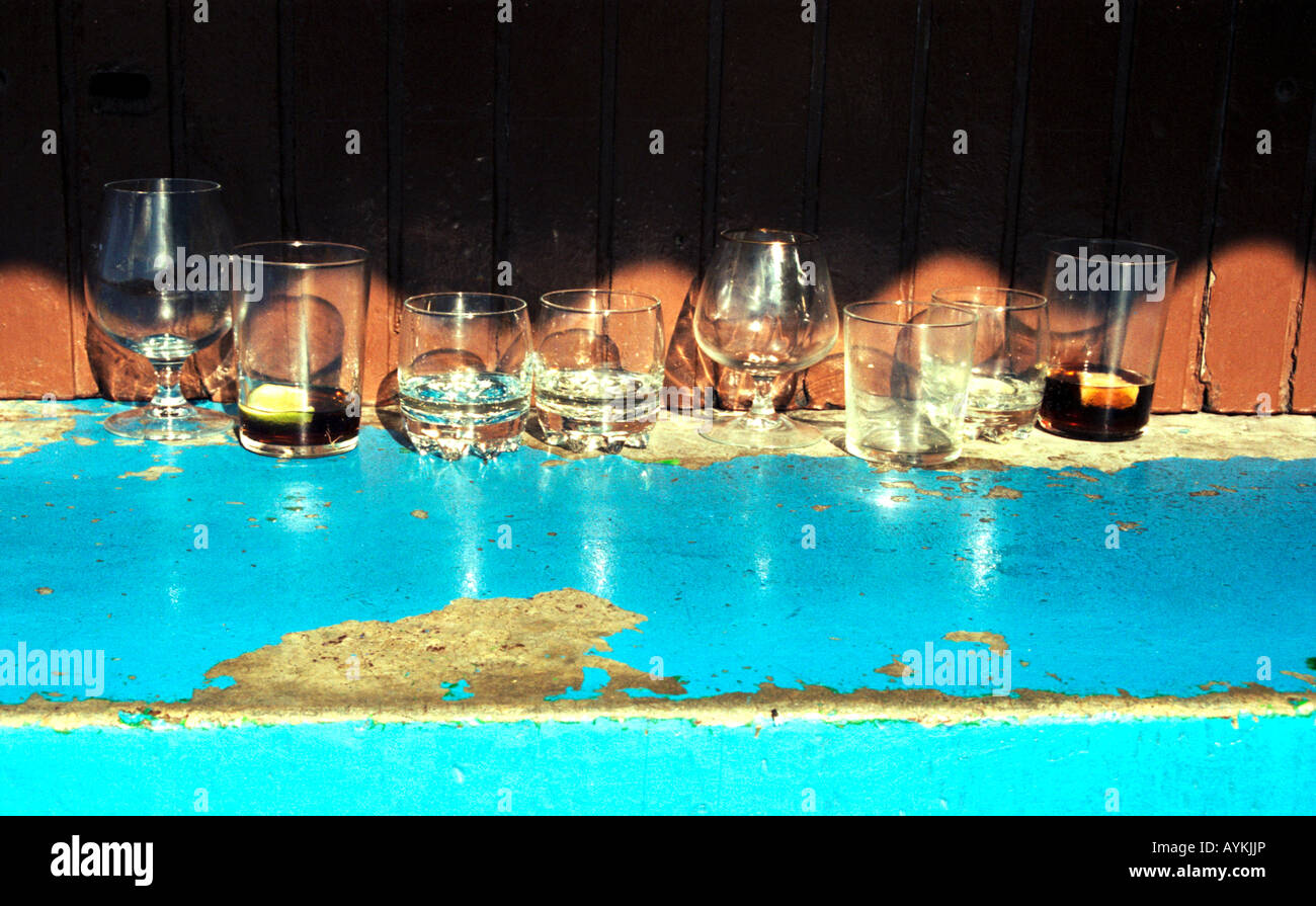 Sunlight on empty glasses in open air Spanish bar Stock Photo Alamy