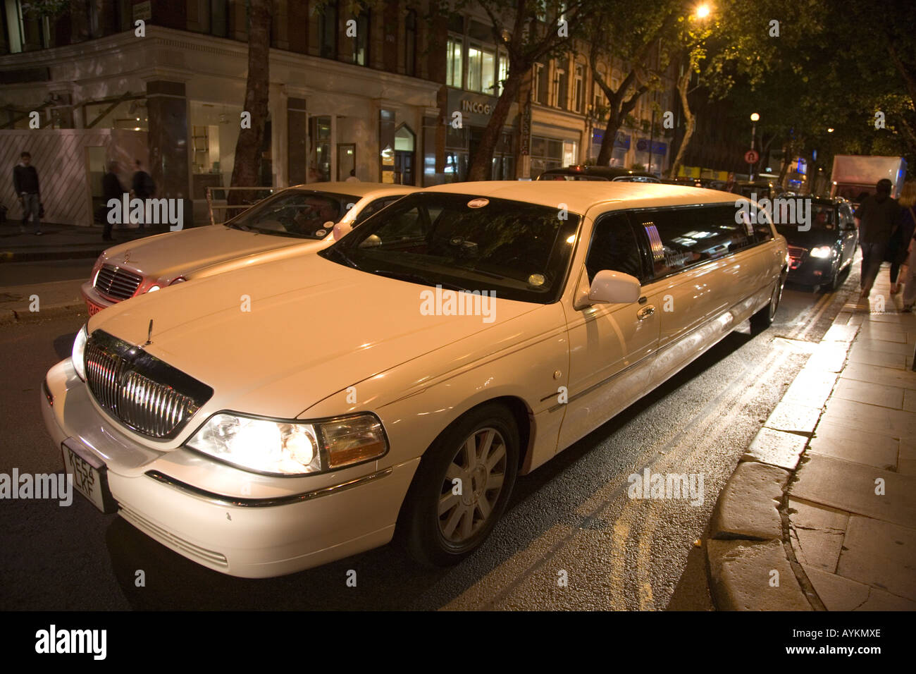 White stretch limo in Soho London England Stock Photo - Alamy