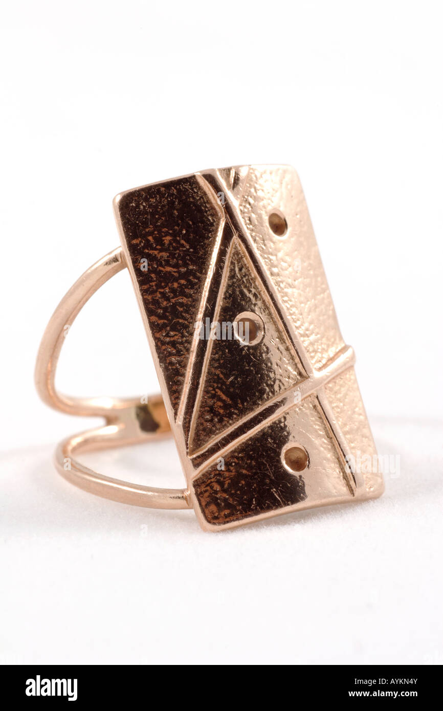lady′s golden ring on white background Stock Photo