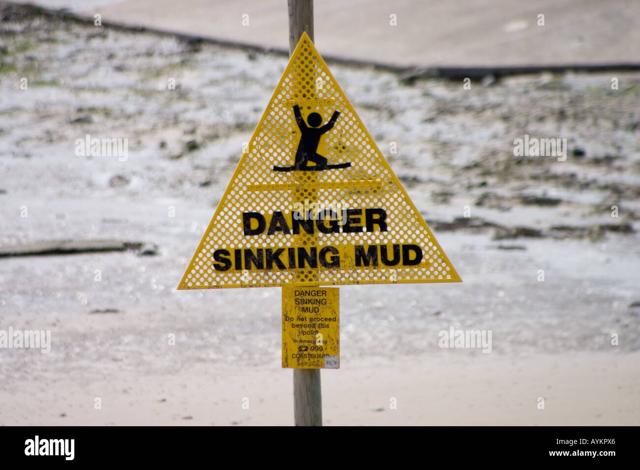 warning sign about skinking mud Stock Photo