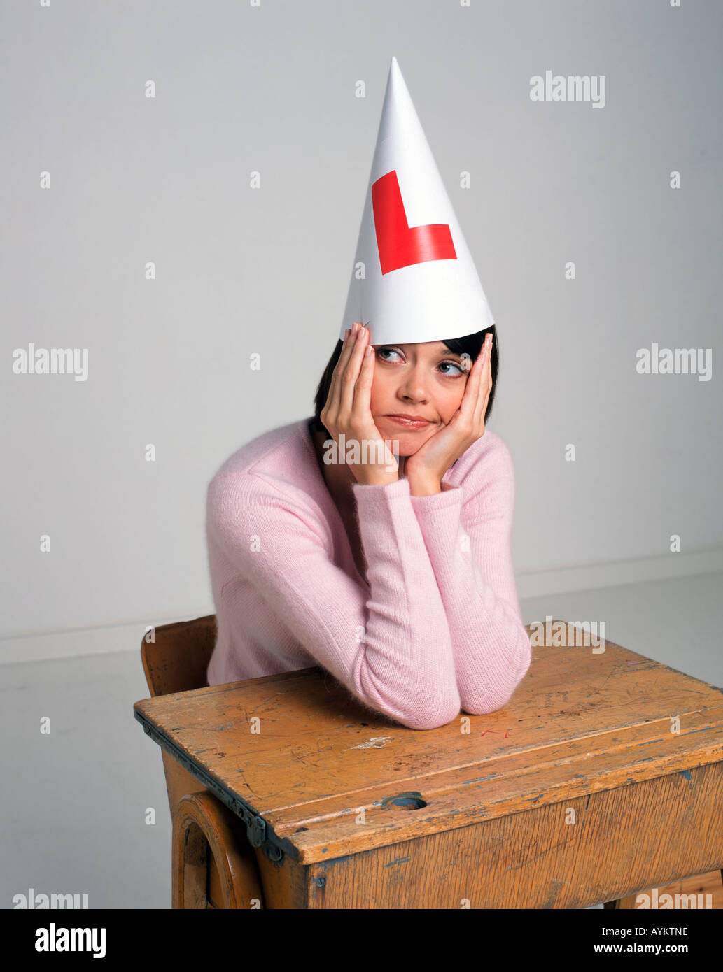 Woman in dunce cap hires stock photography and images Alamy