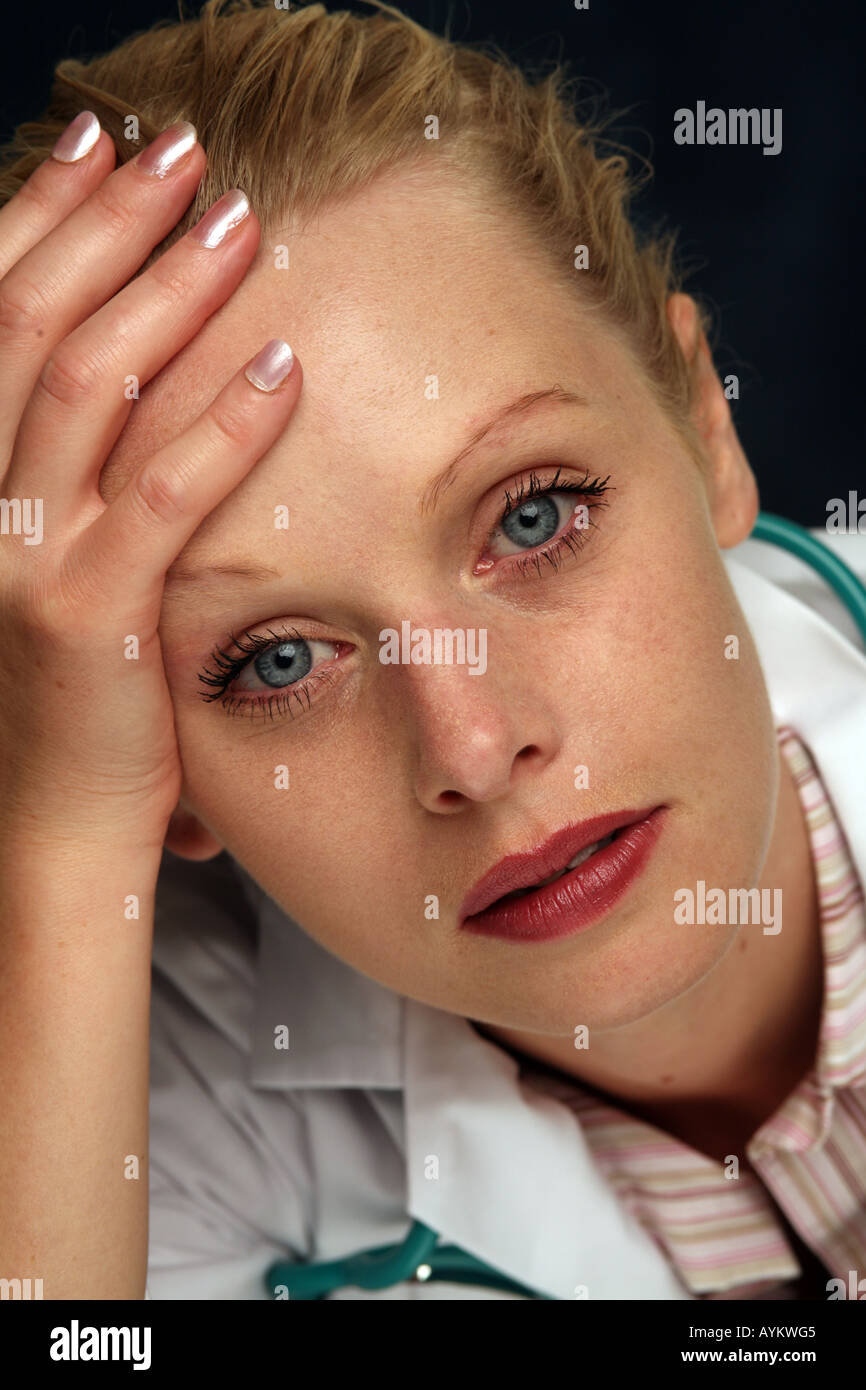 Junior doctor tired hi-res stock photography and images - Alamy