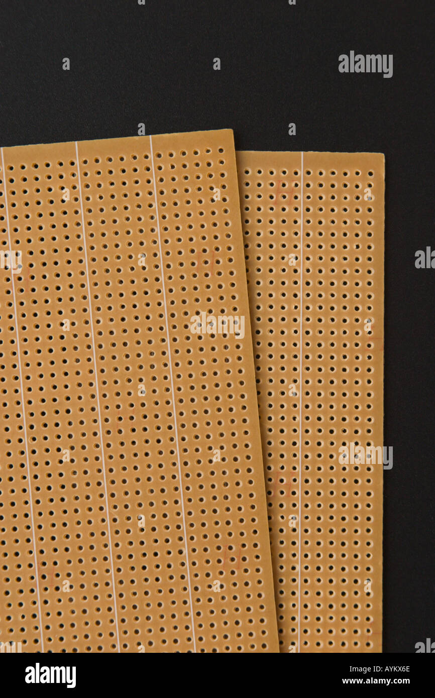 strip board used for electronics prototyping Stock Photo