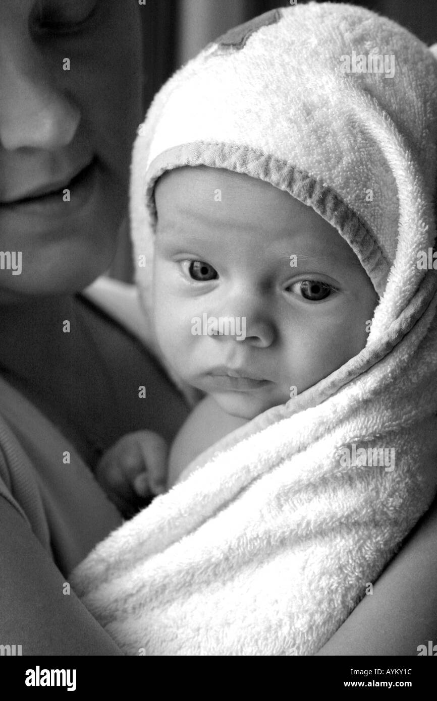 Holding baby in towel Black and White Stock Photos & Images Alamy