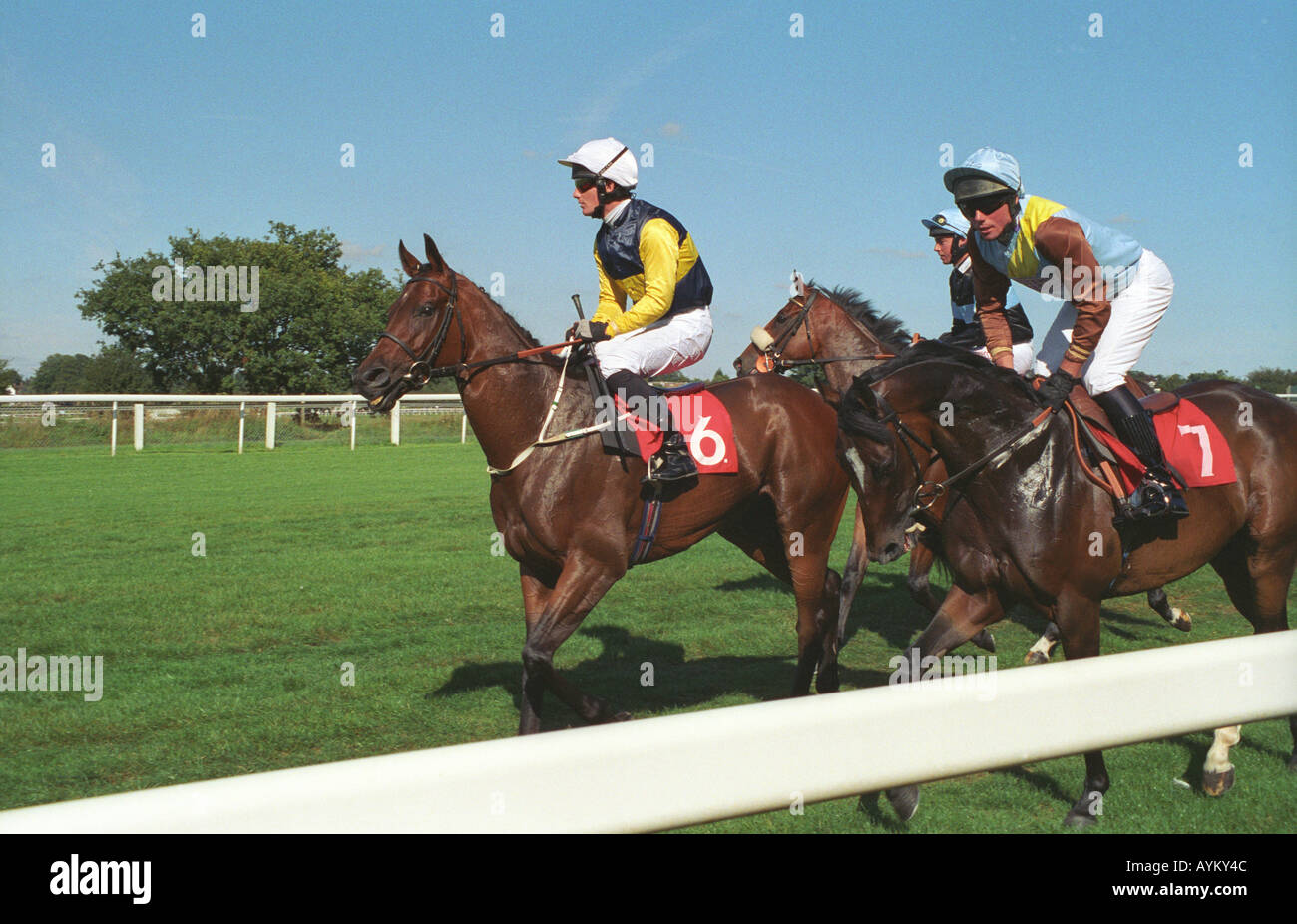 jockeys trotting to start of race at Epsom Racecourse Stock Photo - Alamy
