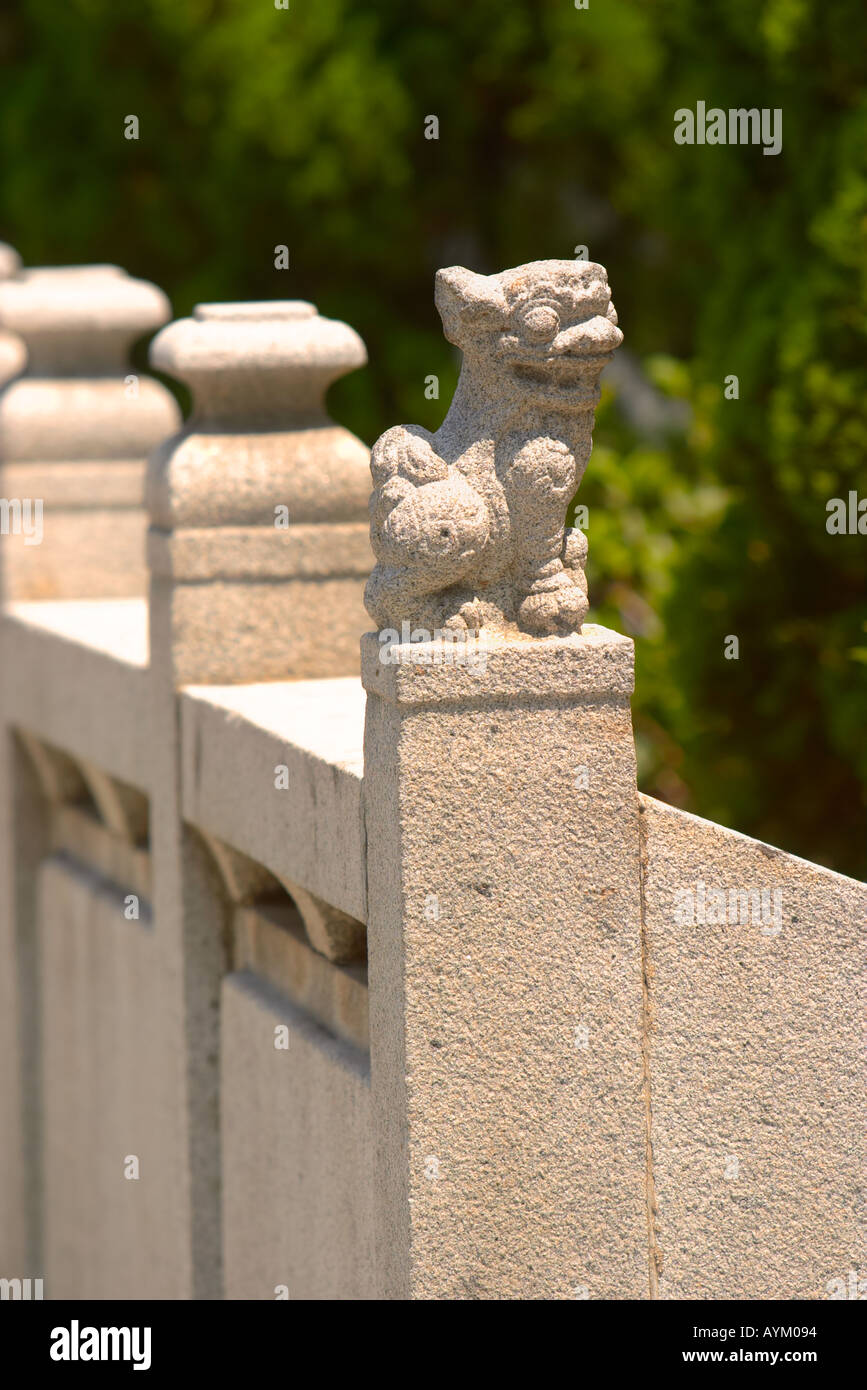 Small stone lion statue at the Kun Iam temple Macau China Stock Photo