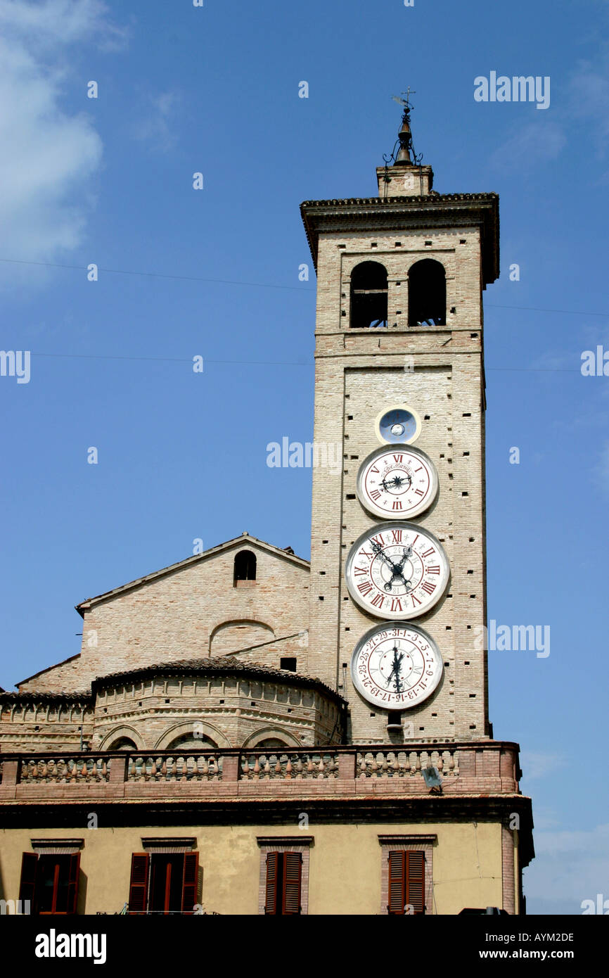 The unusual triple clock face church tower in Tolentino ,Le Marche ,Italy Stock Photo