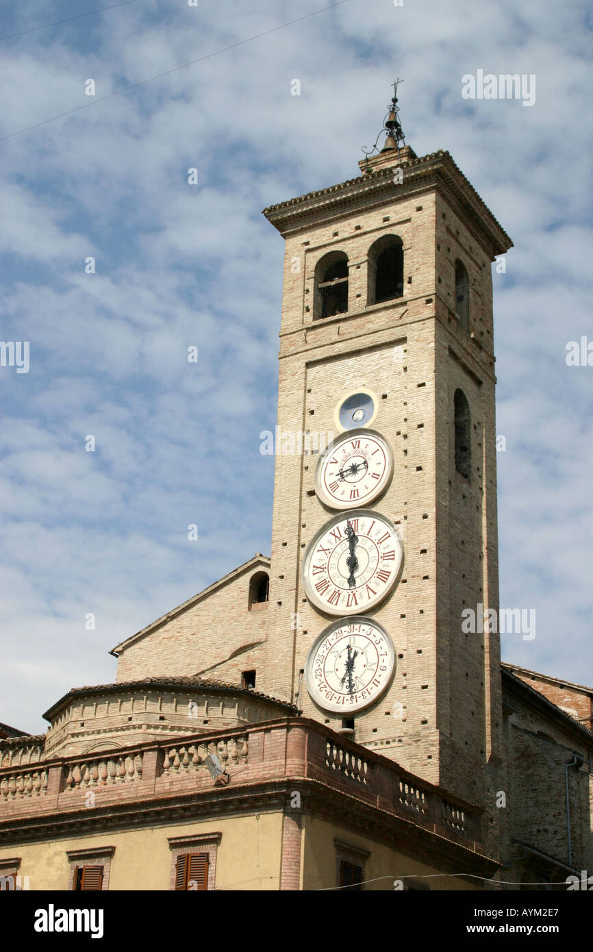 The unusual triple clock face church tower in Tolentino ,Le Marche ,Italy Stock Photo