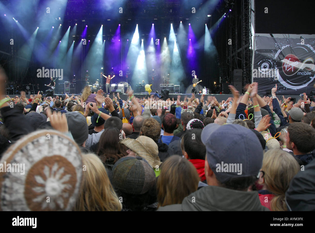 Landscape shot over crowds heads to Snow Patrol performing live on