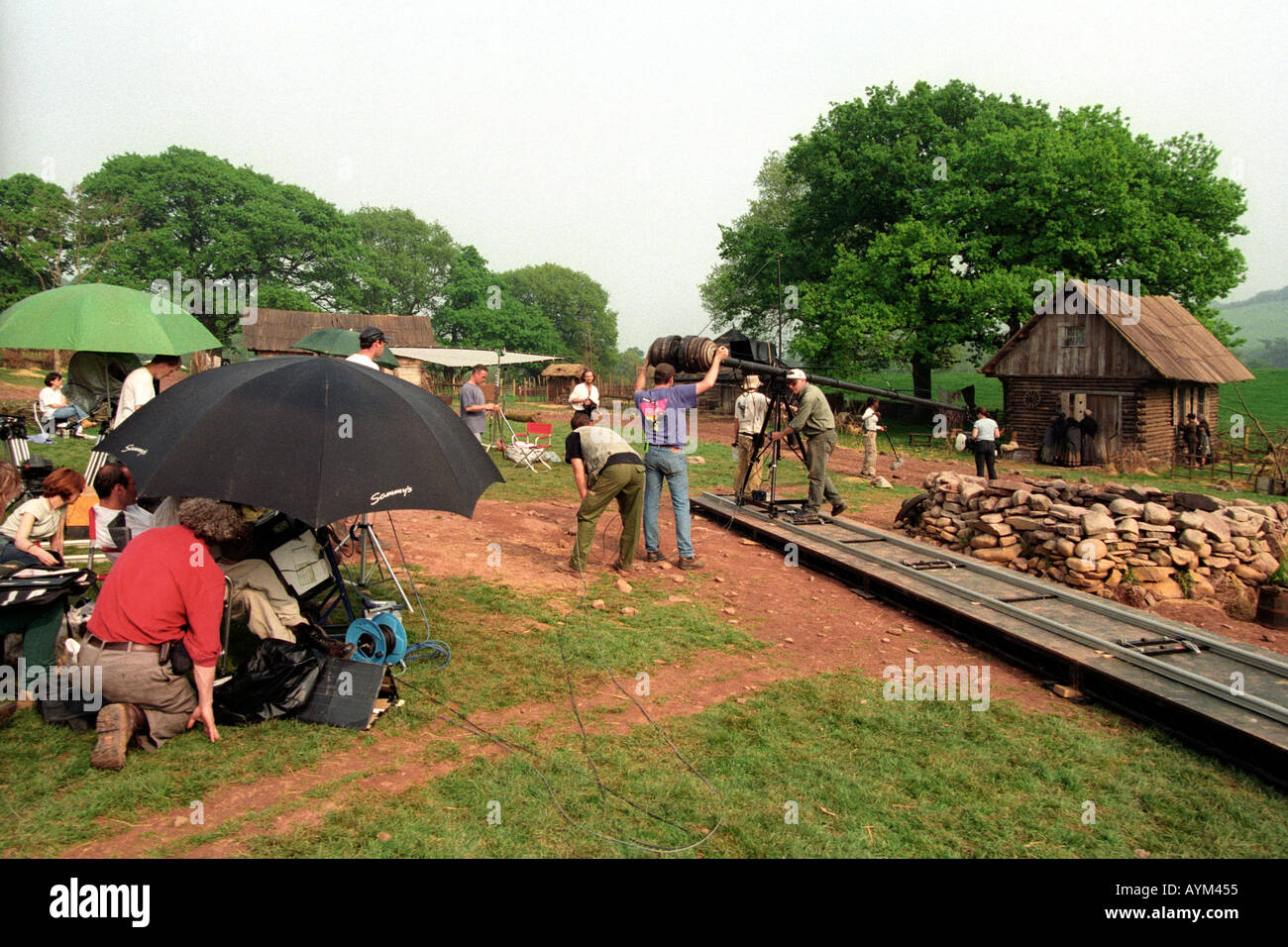 Cameramen work on the filmset of 'Simon Magus' being shot in countryside near Llangynidr Powys South Wales UK Stock Photo