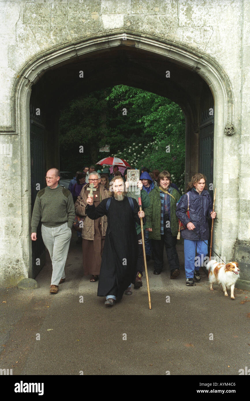 Pilgrims leaving Llantarnam Abbey gates on pilgrimage walking to