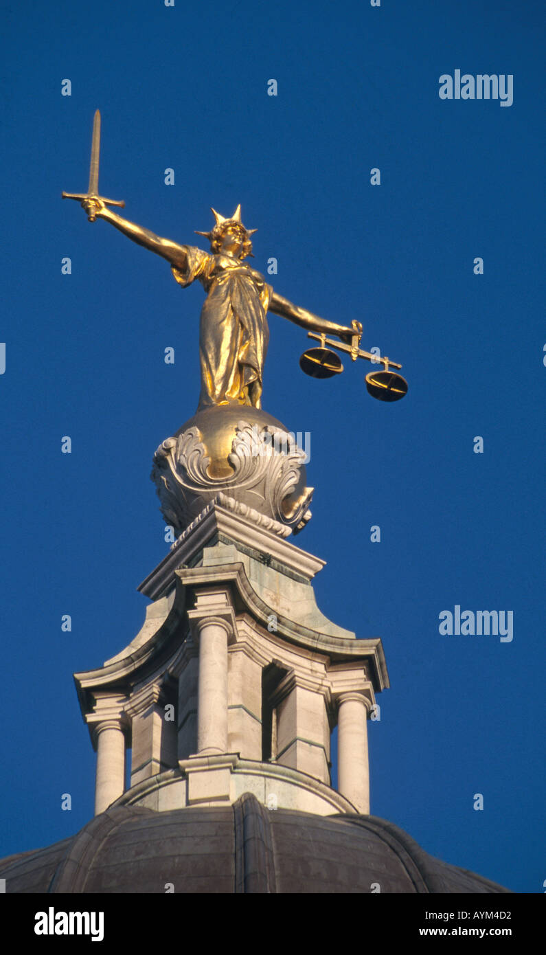 Gold statue of Justice with scales on Old Bailey Criminal Law Courts
