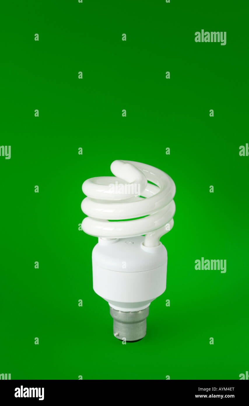 Light bulb isolated on green Background Stock Photo