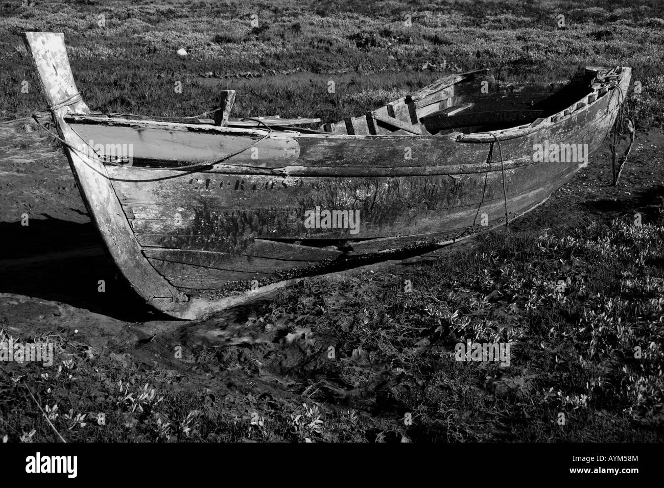 Wooden boat on coast Black and White Stock Photos & Images - Alamy