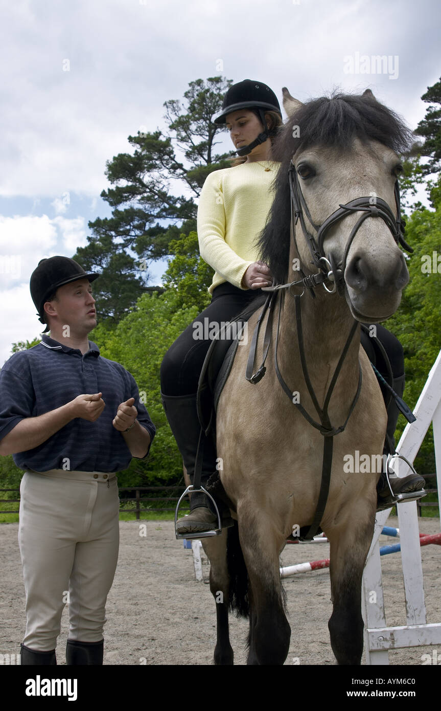 Horse riding instructor with pupil Ashford Castle Cong Co Mayo Ireland
