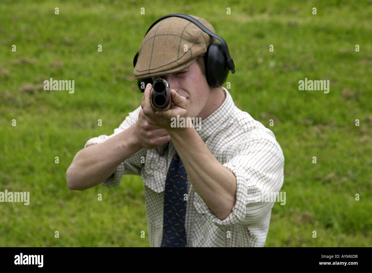 Man pointing shotgun at the camera Stock Photo Alamy