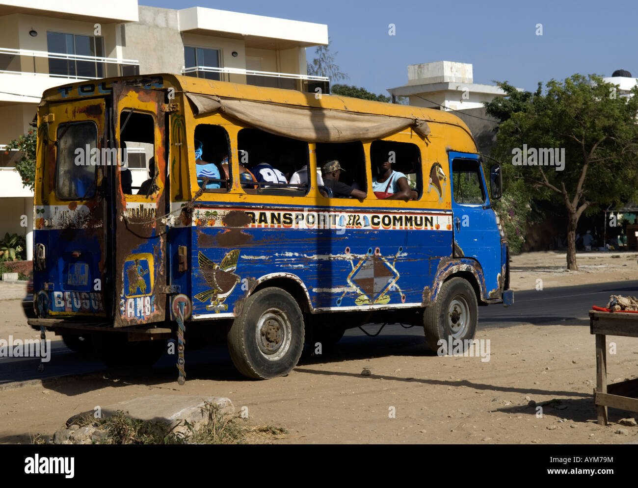 Jitney bus stops to pick up passengers in Dakar, Senegal. Stock Photo