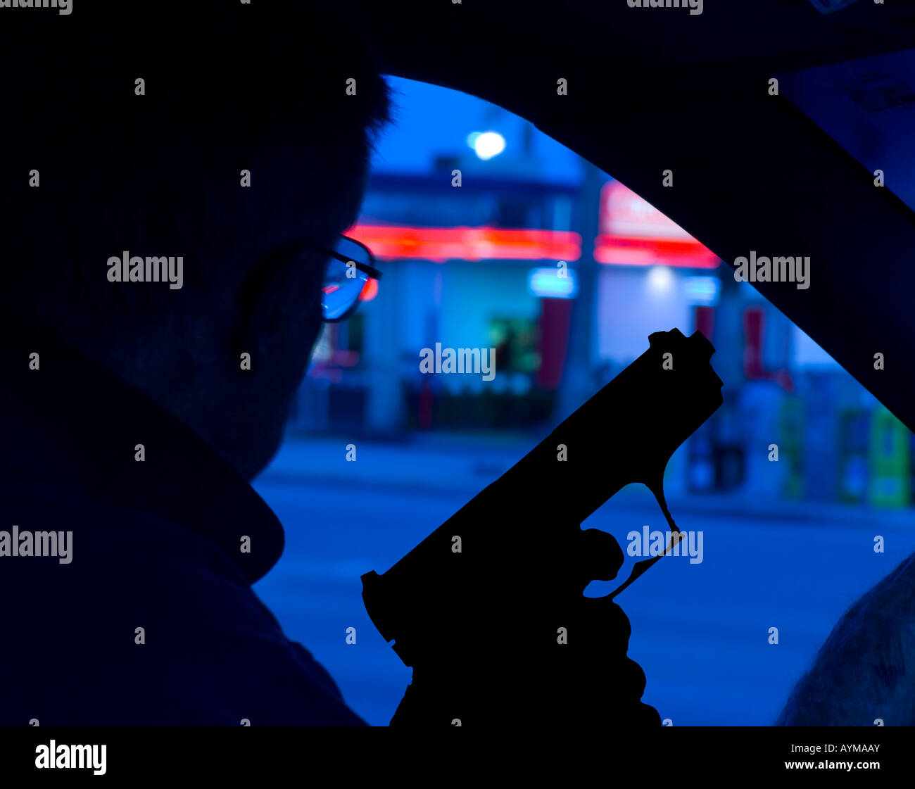 law enforcement officer with gun drawn in unmarked car at stakeout ...