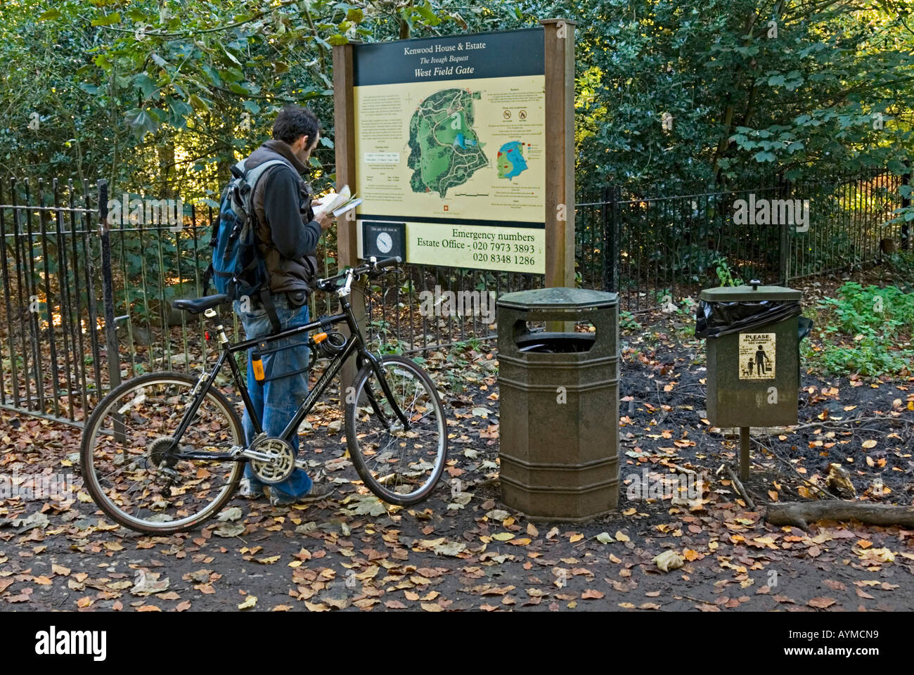 A park visitor trying to find his way around Hampstead Heath Stock Photo