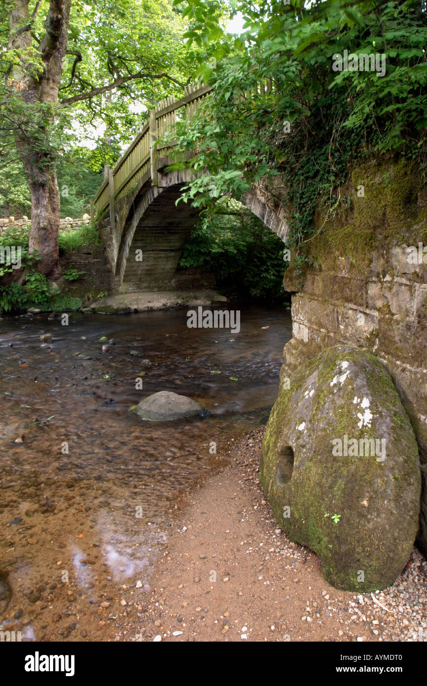 Ancient packhorse bridge at Beckfoot Bingley West Yorkshire England