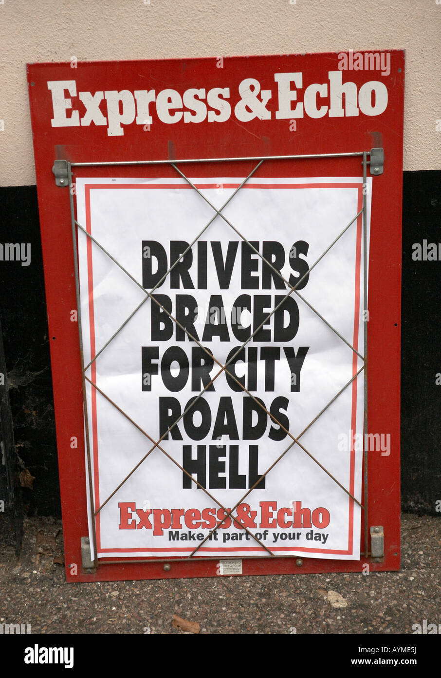 Automobile drivers and readers of local paper being warned of pending chaos on the roads. Stock Photo