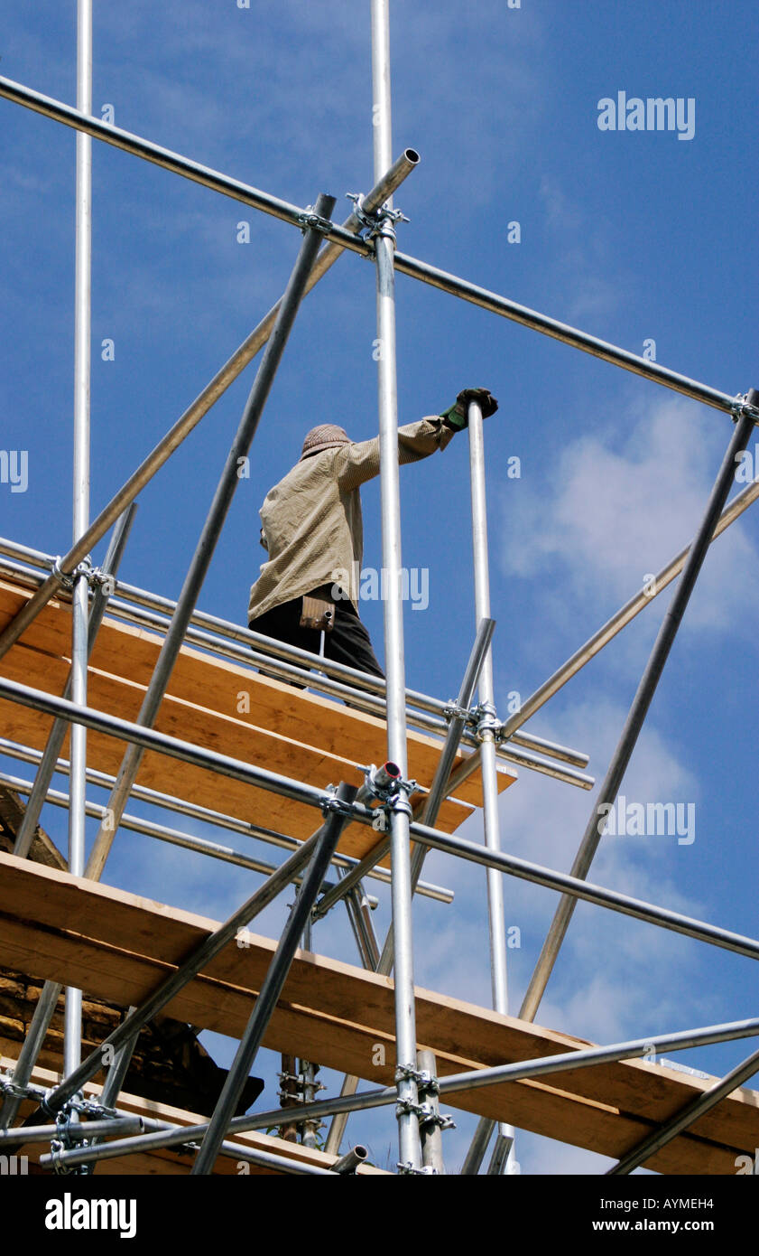 Scaffolding being erected around old building due for renovation Forster Square area Bradford