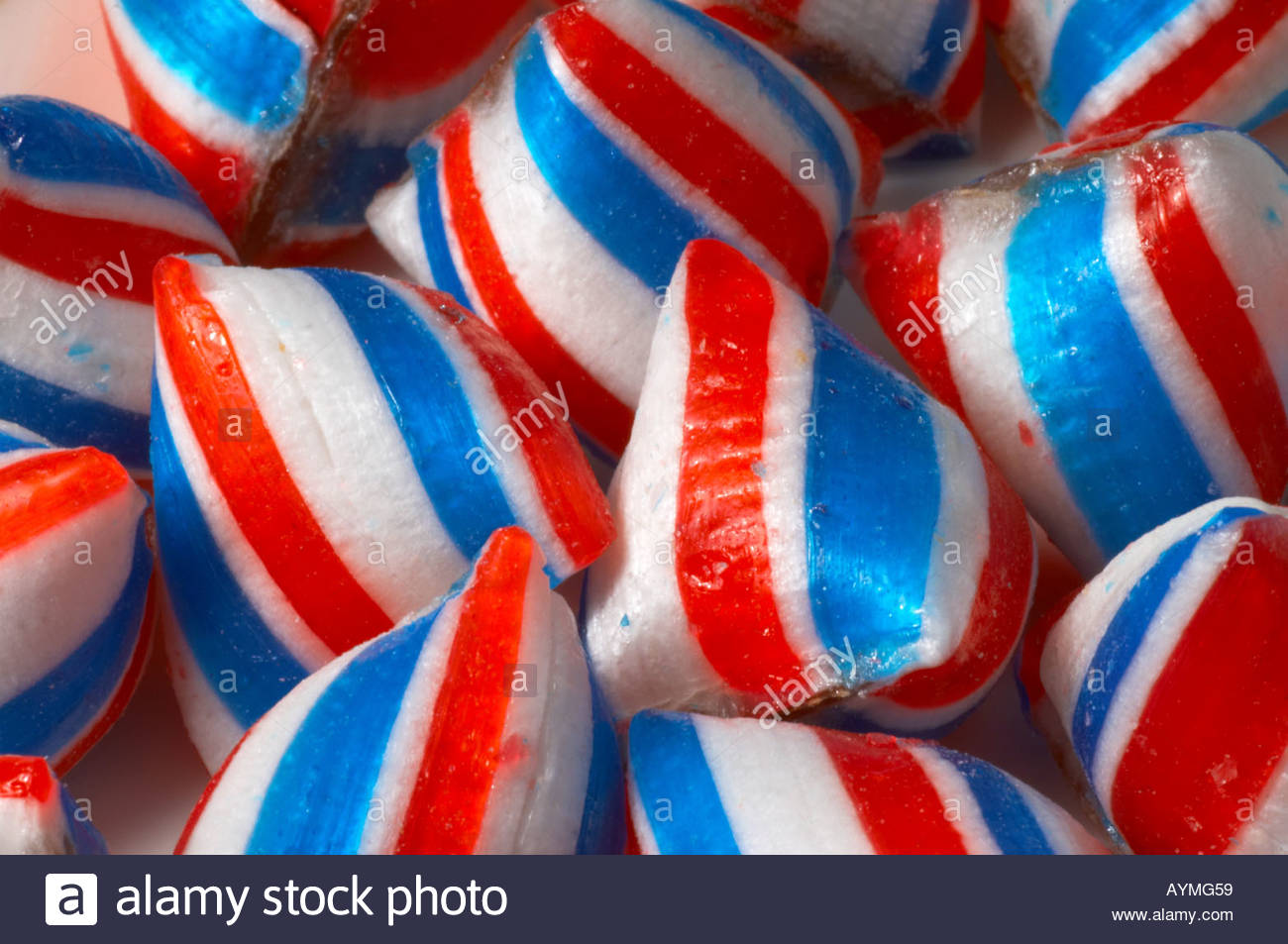 A number of coloured striped boiled sweets Stock Photo